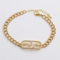 Bracelet doré ajustable avec pendentif étoile et lune serti de zircons sur fond blanc - Bracelet Étoile Lune