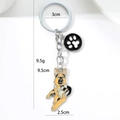 German Shepherd metal keychain with black paw print charm and 3cm diameter ring - Lying Wolf Dog (Lying Little Wolf Dog Paw)