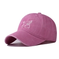 Detailed macro view of magenta washed cotton baseball cap with palm tree embroidery - Adjustable / Pink