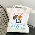 White nurse canvas tote bag with colorful cartoon characters and friendship quote - Style C11 (No Inner Pocket/No Zipper)
