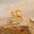 Close-up of golden double-layered wave ring with zircons on natural stone surface - Double Layer V-Shape (WG-1442) / KC Gold