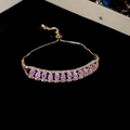 Macro shot of gold bracelet featuring pink teardrop zircon and adjustable slide clasp - 30# Gold Pink Teardrop Rectangle Zircon Style