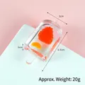 Realistic popsicle pendant with strawberry and orange slices in transparent resin, 6.5cm - Round Strawberry