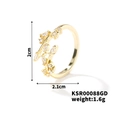 Adjustable golden leaf ring with transparent zircon stones on white background - Gold Tone With Clear Zirconia