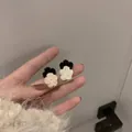 Handcrafted crochet flower stud earrings in black and white knit contrast design - Black White Crochet Flower Stud