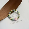 Pastel ceramic beaded bracelet featuring a pink flower charm and colorful round beads - 938A Mint Candy Summer
