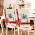 Linen Christmas chair covers featuring Joy prints and red bows in a festive home setting - YT03-15 (Beige Bow JOY)
