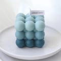 Blue gradient bubble cube candle in 3x3 ball matrix design on a white ceramic tray - Gradient Green - Teak