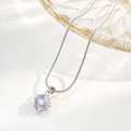 Invisible fishline necklace featuring a light blue spherical gemstone heart pendant - White Spherical Style (X779)