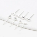 Macro detail of eight S925 sterling silver ball post earrings with jump rings for DIY - 3mm Ball/Vertical Open Loop / Thick Silver
