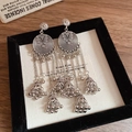 Detail view of silver round tassel earrings with vintage bohemian spiral textures - Silver (S925 Silver Needle)