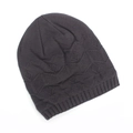 Detail of dark grey knit beanie showing geometric diamond pattern and ribbed texture - Dark Gray