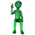 Minimalist green resin alien figurine with large black eyes on a white background - Green Alien Figurine