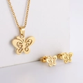 Macro detail of a gold butterfly jewelry set with a polished necklace and stud earrings - Hollow Butterfly Set