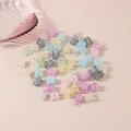 Mini rabbit hair clips in various macaron colors on a clean pink background - Rabbit Ear / Bulk Packaging / Matte Light Colors