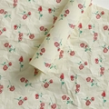 Cream tissue paper with red rose print for bouquet wrapping and floral gift packaging - Rose Sydney Paper [Style A]