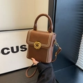 Brown leather crossbody phone bag with gold braided buckle and white bead trim - Brown