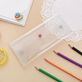 Detail of laser transparent PVC pencil case with glitter effect and snap closures - Glittery White
