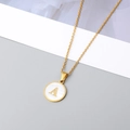 18K gold plated necklace featuring a round white shell pendant with a golden letter A - Letter A Style / Gold