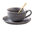 Detail of matte grey ceramic coffee cup with vertical stripe texture and golden spoon - Pumpkin Shape-Gray