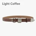 Damen Ledergürtel in Hellbraun mit runder Silberschnalle und metallischen Ringdetails - Hellkaffee