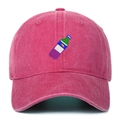 Detailed close-up of colorful beverage bottle embroidery on vintage wash baseball cap - Rose Red