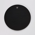 Black round silicone honeycomb trivet mat with hanging hole shown on white background - Black