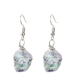 Close-up of handmade silver wire wrapped natural fluorite crystal earrings in purple and green - Silver + Fluorite
