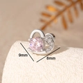 Silver heart stud earring with pink zircon and 9mm by 8mm dimensions on textured surface - Pink (Single Piece)