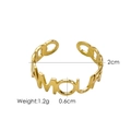Detail view of gold open ring with AMOUR cutout lettering and chain link band details - Gold-AMOUR