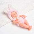 Realistic 8-inch reborn baby doll wearing a pink rabbit plush onesie in sleeping pose - Pink Rabbit Plush Style
