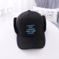 Detail of black fleece earflap hat featuring blue city embroidery for winter warmth - Kids (51-53CM) / Black