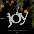 White glitter Joy letter Christmas ornament with silver hanging string and pine needles - Letter Style