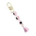 Pink Turkish evil eye keychain with gold alloy clasp and silk tassel detail - Pink