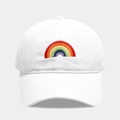 Close-up of rainbow embroidery detail on a white cotton baseball cap with curved brim - Adjustable / White