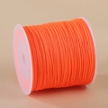 Vibrant orange 0.8mm nylon cord for handmade jewelry on a white plastic spool - Orange