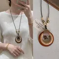 Collana vintage con anello in legno, dettagli intrecciati e campanello in bronzo - 5# Collana-Nero Caffè