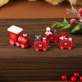 Detailed view of handcrafted wooden Christmas train set with festive bear and snowman figures - Red