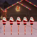 5-piece set of solar Santa Claus garden stake lights with candy cane glowing poles - Santa Claus (Red Tube)