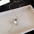 Detail of silver snake chain necklace with pearl and tiger eye stone pendant in a jewelry tray - Pearl Tiger Eye Pendant Style / Silver Necklace (1#)
