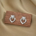Titanium steel heart-shaped earrings set with cubic zirconia and polished silver finish - Silver Stud Earrings