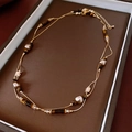 Detailed macro view of retro tiger eye and pearl double-layer necklace on jewelry tray - Retro Luxury Double Long Style (40#)