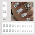 Macro detail of French white tip glitter press-on nails with full 24-piece set display - W507 Silver Galaxy
