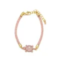 Pink mesh tube bracelet featuring a rose gold sea turtle charm with white crystals - Rose Gold