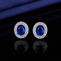 Oval blue zircon stud earring with double halo white stones on black mirror - Hepburn-style Sapphire Blue Diamond Stud Earrings Led-86