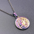 Detailed macro view of rainbow plated stainless steel lion head relief pendant necklace - Necklace / Rainbow