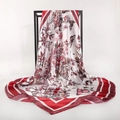 Close-up of silk-textured scarf with detailed butterfly floral prints and red geometric border - Red White Butterfly Flower (3)