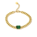 Detail of 18K gold-plated Cuban link bracelet with a rectangular green zircon stone - Emerald