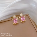 Macro shot of pink turtle earrings in gold finish with sparkling zircon details - S925 Silver Pin + Gold Plated Copper / Sea Turtle Stud Earrings Pair (D140)