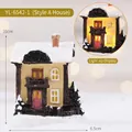 Miniature Christmas house decoration with LED lights and snow-capped roof 10cm - Model A House